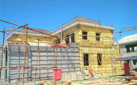 墻體自保溫聚氨酯噴涂機分析(圖2) 墻體自保溫聚氨酯噴涂案例